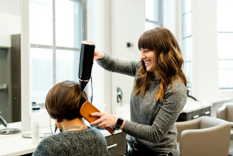 A stylist working in a salon