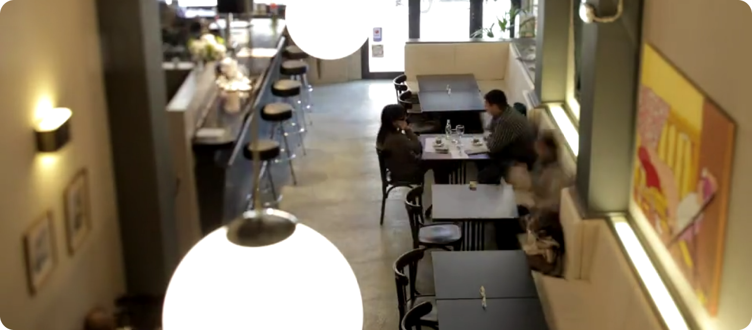 Guests and servers inside a restaurant